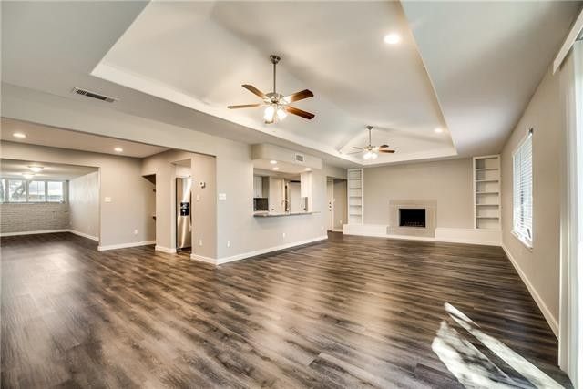 large room with grey walls